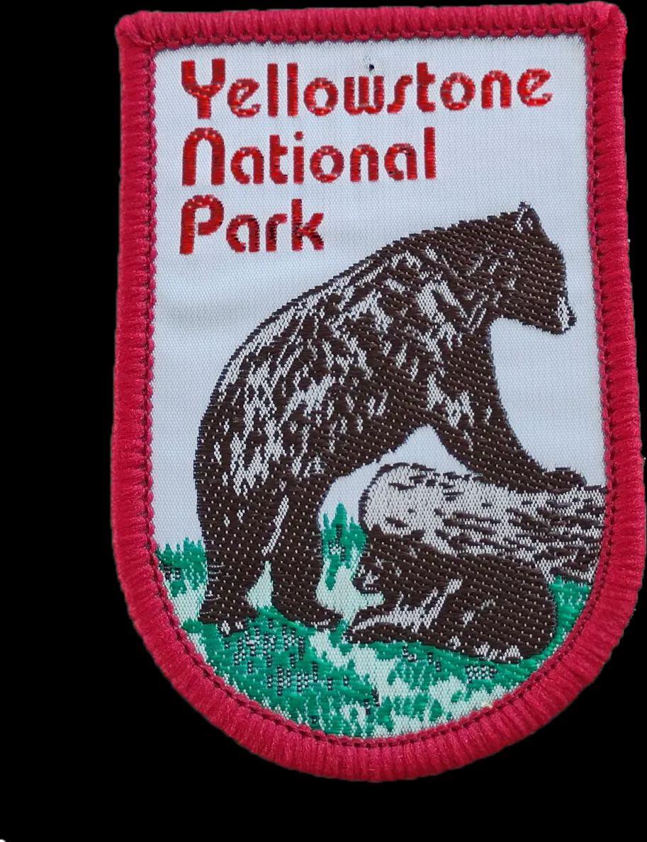 Sewn patch that says Yellow Stone National park, featuring a bear and her cub.